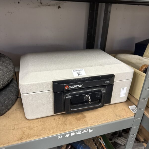 Sentry 1100 strongbox with key, vintage security box.
