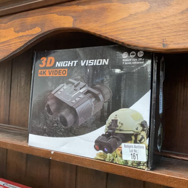 Boxed night vision goggles with 3D and 4K video capabilities.