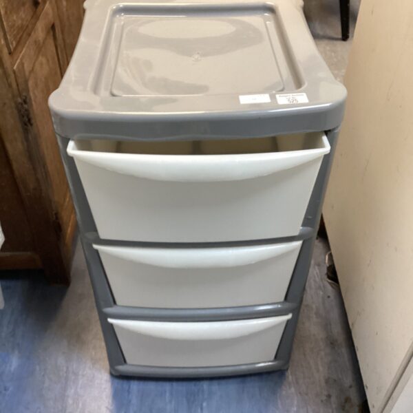 Front view of a three-drawer plastic storage set.