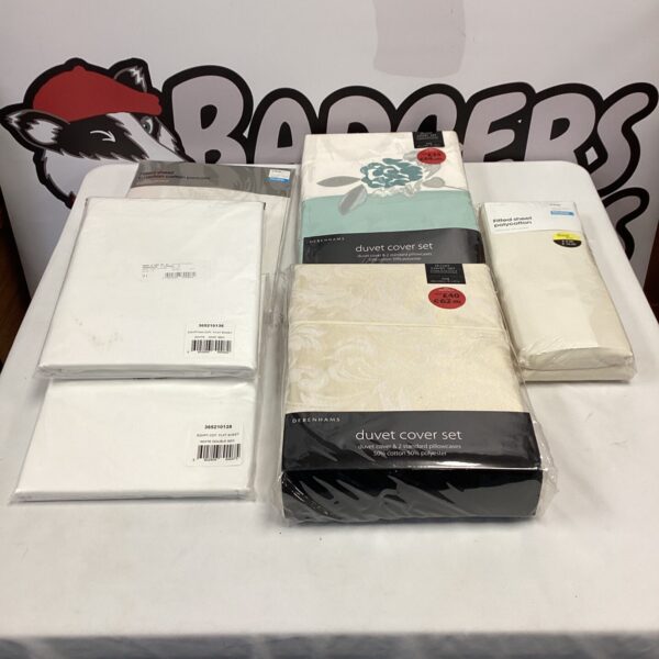 Debenhams king size floral duvet set with fitted sheet.