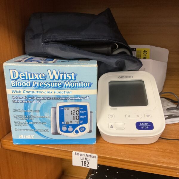 Omron M3 wrist blood pressure monitor with digital display.