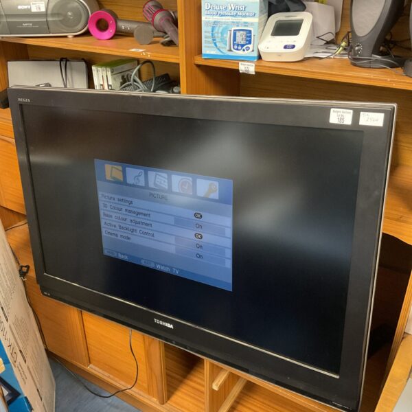 Toshiba Regza 42 inch HD television with wall mount bracket.