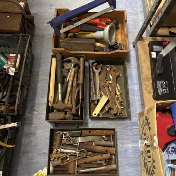 Assorted hand tools in trays from a shed clearance lot.