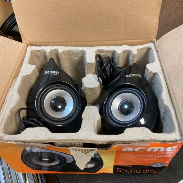 Black Krator multimedia speakers with Acme branding.