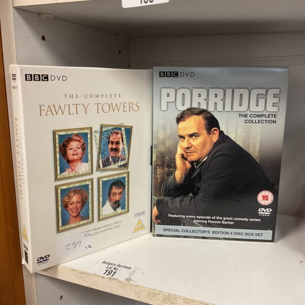 DVD box sets of Fawlty Towers and Porridge, classic British comedy.