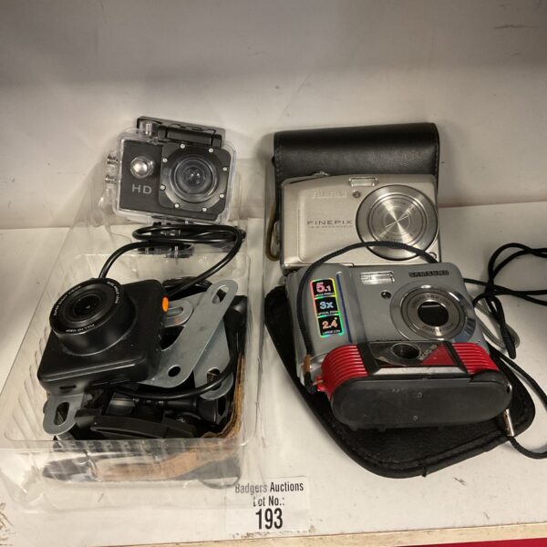 Digital cameras lot including action cam and Samsung camera.