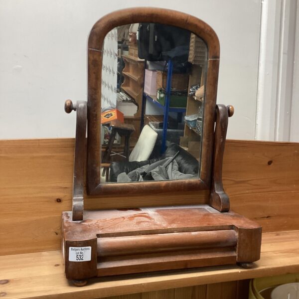 Vintage dressing table mirror with wooden frame and bevelled edge.