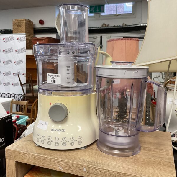Clear plastic jug of a Kenwood blender, kitchen appliance.