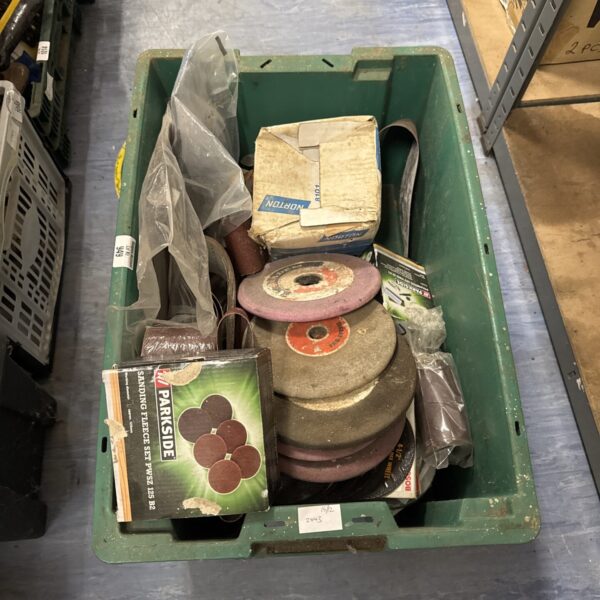 Mixed lot of grinding discs and workshop consumables for power tools.