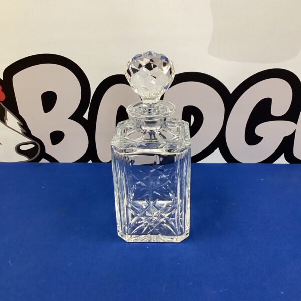 Faceted Stewart Crystal decanter for serving liquor.