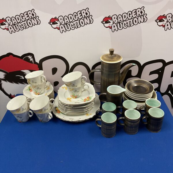 Vintage coffee and tea set with delicate ceramic pieces.