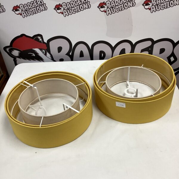 Pair of vintage yellow plastic lamp shades for ceiling lights.