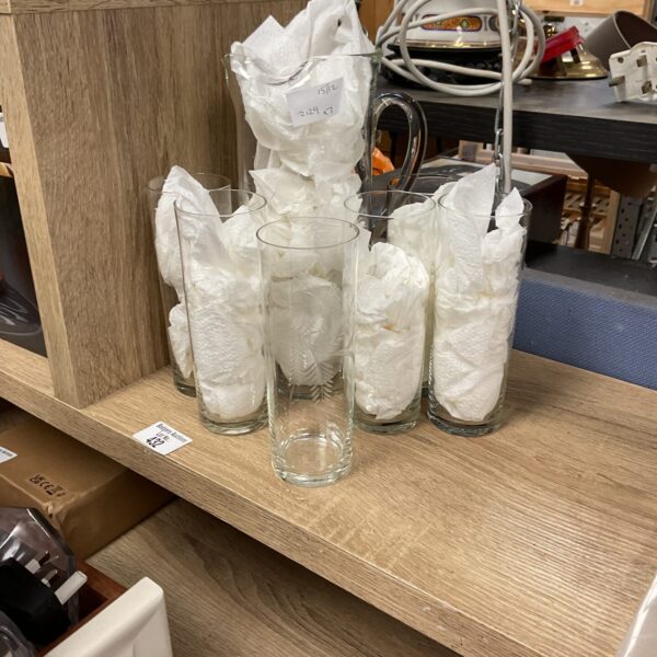 Vintage hand carved floral glasses in a protective wrapping.