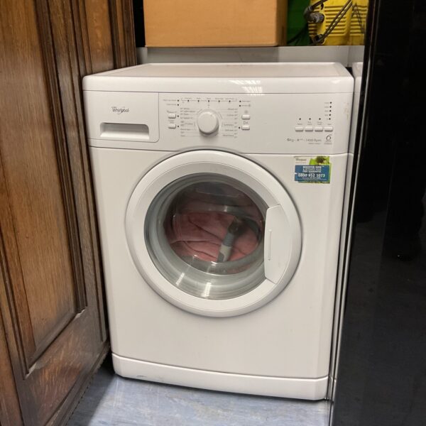 White Whirlpool 6kg washing machine in used condition.