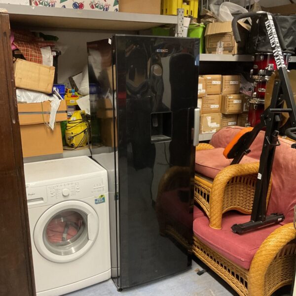 Large black Beko fridge freezer in a kitchen setting.