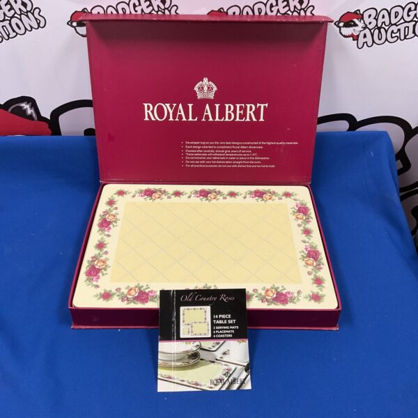 Royal Albert Old Country Roses table set with placemats and coasters.