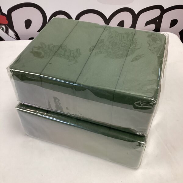 Sealed packs of Oasis floral foam blocks for flower arranging.