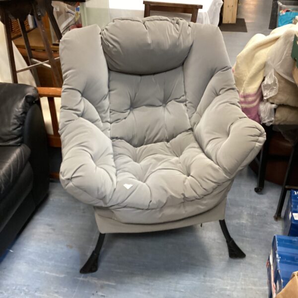 Comfortable modern grey chair with padded seat and back.