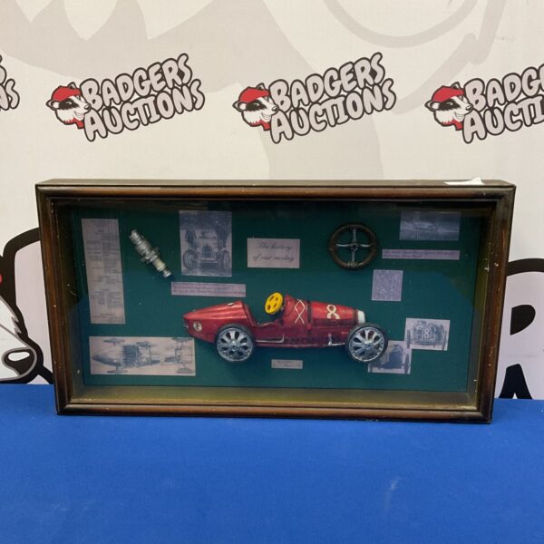 Vintage car racing diorama framed display for collectors.