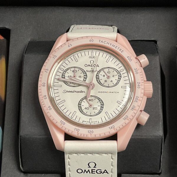 Front view of the pale pink Omega Swatch MoonSwatch Venus watch.