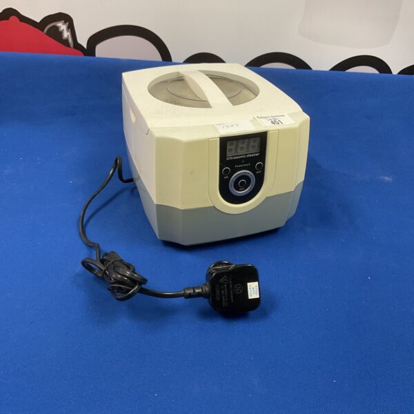 Compact ultrasonic cleaner machine for jewellery and dental tools.