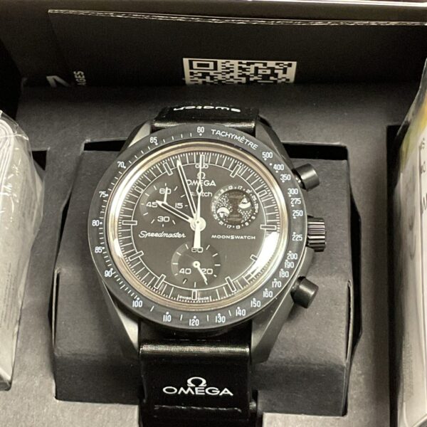 Front view of the Omega Swatch Moonphase bioceramic watch.