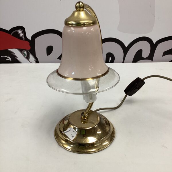 Vintage brass table lamp with frosted glass shade.