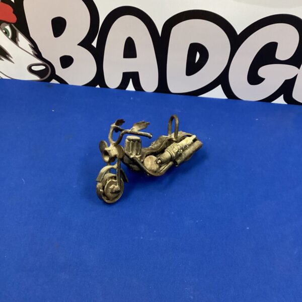 Detailed metal motorcycle sculpture for desk or collectible display.