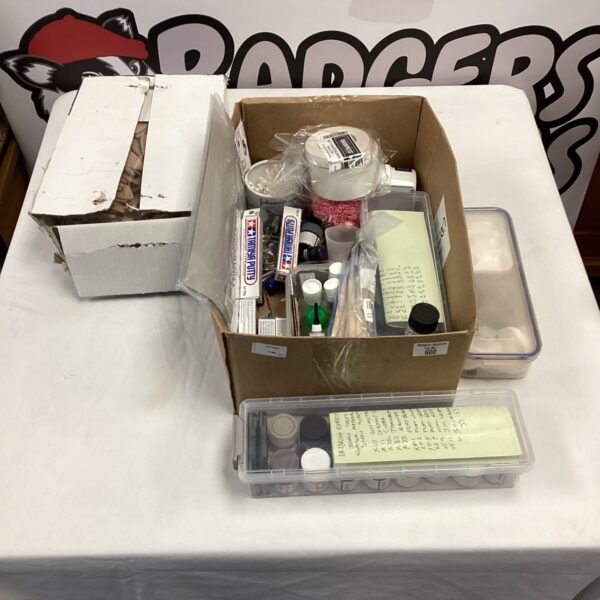 Mixed lot of craft paints and art supplies.