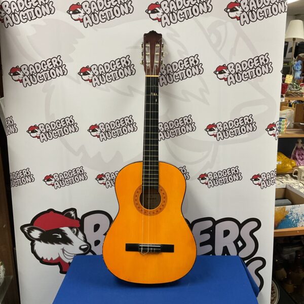 Vintage Hohner MC-05 acoustic guitar in light wood finish.