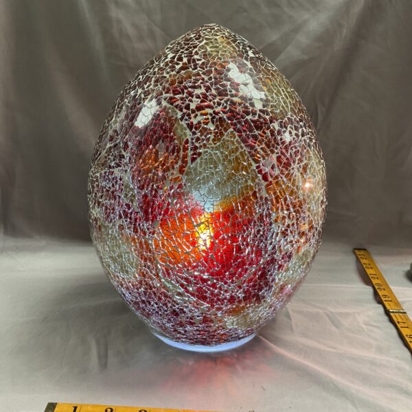 Vibrant vintage crackle glass lampshade with red and orange tones.