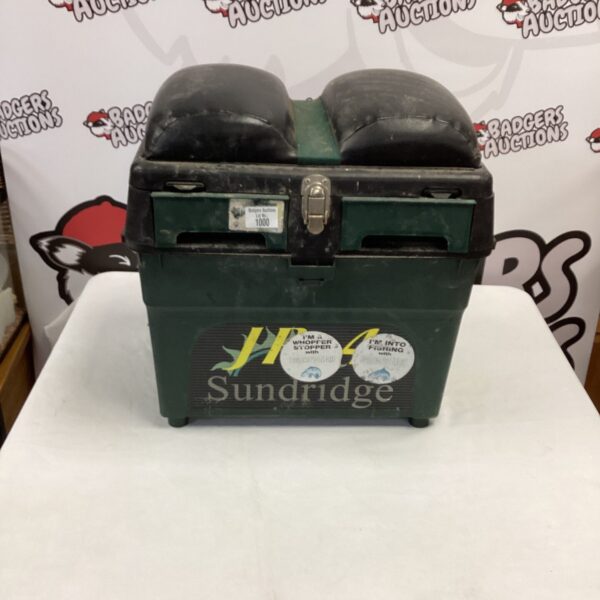 Vintage Sundridge tackle box for fishing storage.