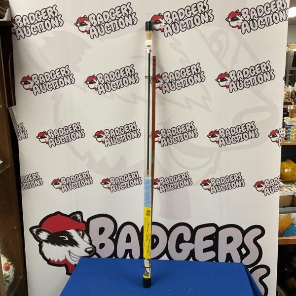 Two 12 gauge gun cleaning rods for firearm maintenance.