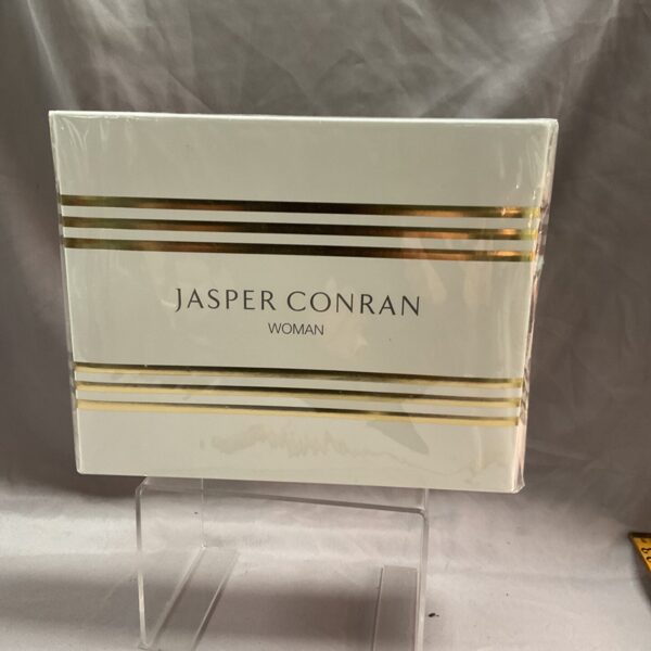 Sealed Jasper Conran Woman perfume set in white and gold packaging.