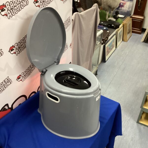 Used Crystals camping toilet for outdoor adventures and travel.