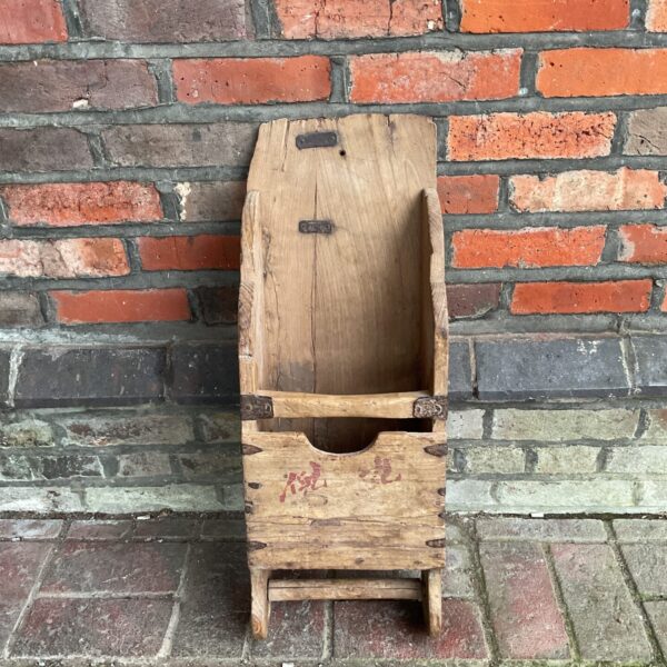 Antique wooden grain scoop, a rustic farm tool collectible.