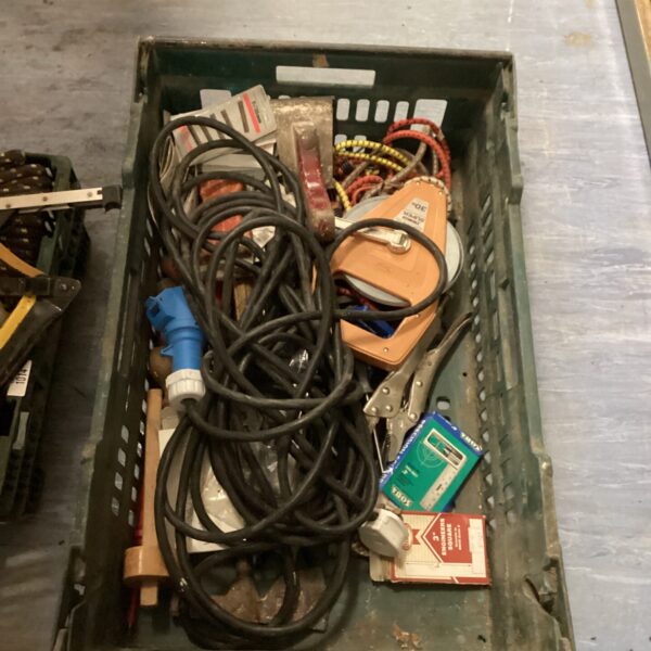Mixed tool lot with power lead and assorted connectors for DIY projects.