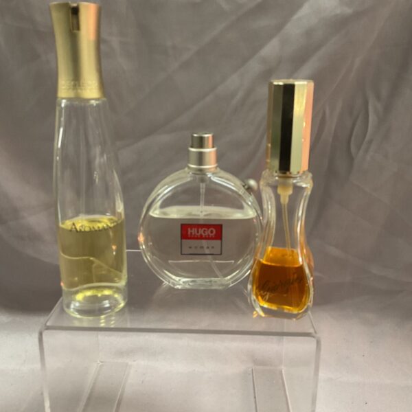 Vintage perfume bottles from Hugo and Giorgio, collectible fragrance.