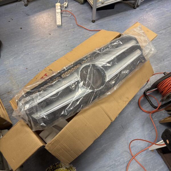 Mercedes GLC front grille in box, automotive exterior part.