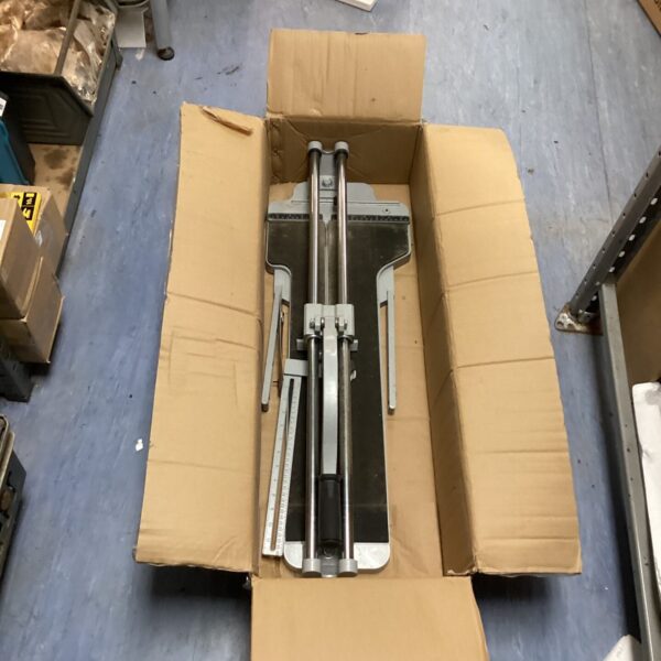 Professional tile cutter tool presented as found for DIY projects.
