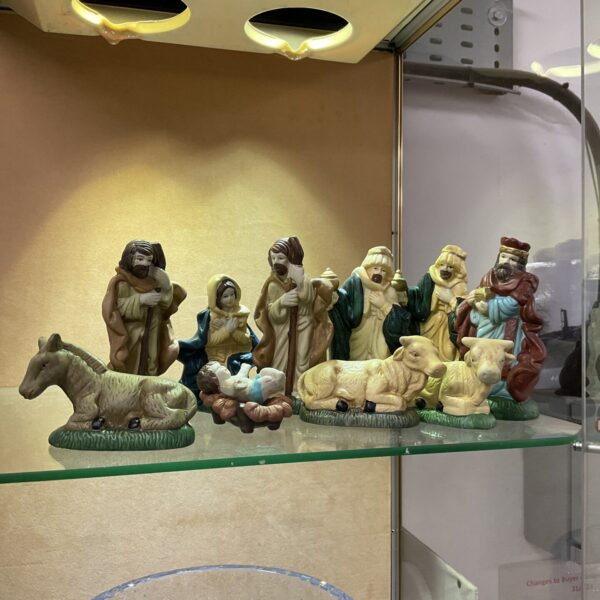 Vintage ceramic nativity scene set with detailed figures.