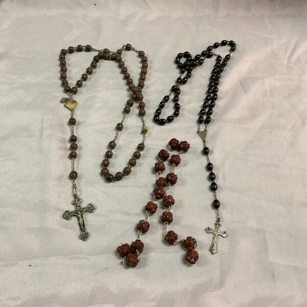 Antique lot of three rosary beads with brown beads and crosses.