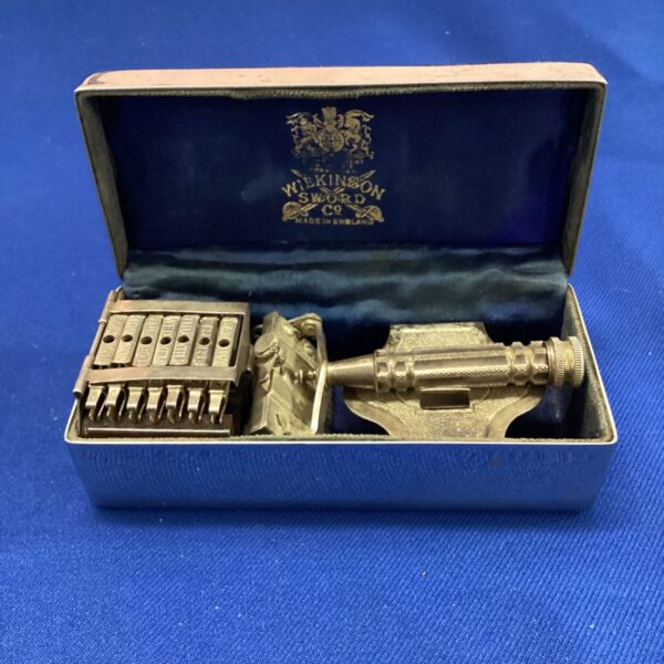 Vintage Wilkinson Sword razor set in original case.