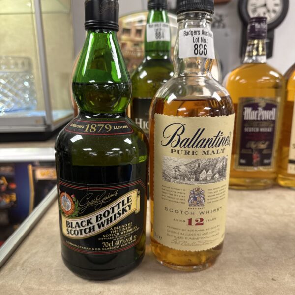Vintage Gordon Grahams and Ballantines whisky bottles, collectible alcohol.