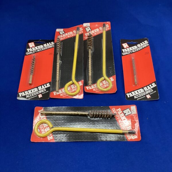 Vintage Parker Hale cleaning rods in a mixed lot for firearm maintenance.