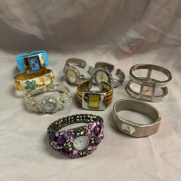 Ladies bracelet watch lot with diverse styles and designs.