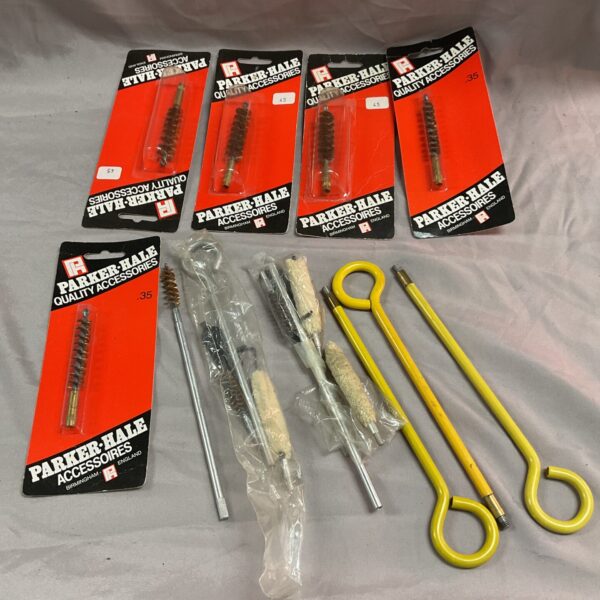 Vintage yellow Parker Hale cleaning rod for firearm maintenance.