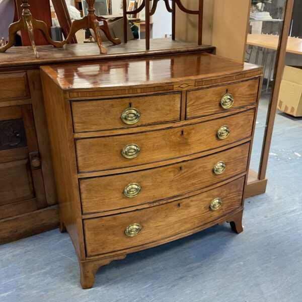 Antique George III Regency mahogany bow front chest of drawers.