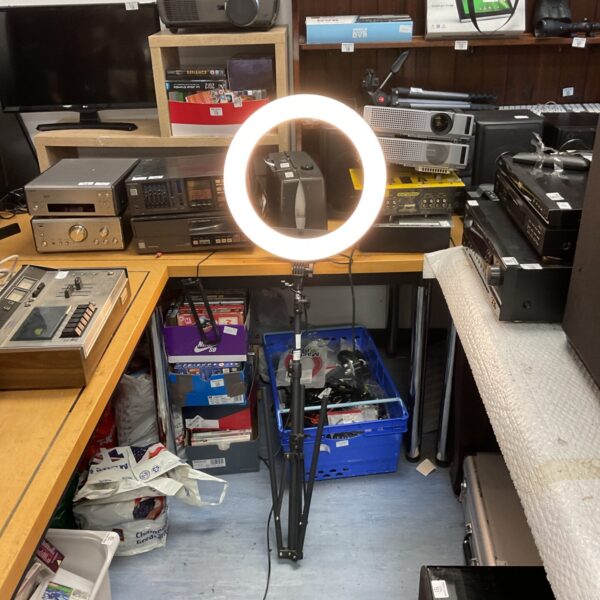 Halo tripod light in a studio setup with other equipment.