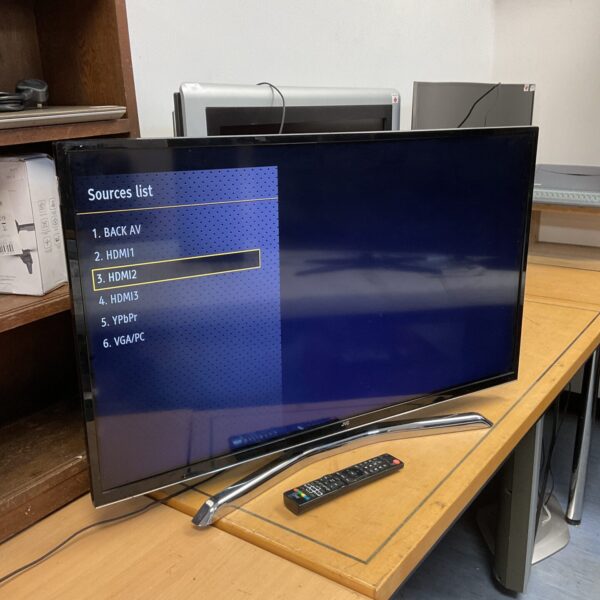 JVC 40 inch LED smart TV with remote control.